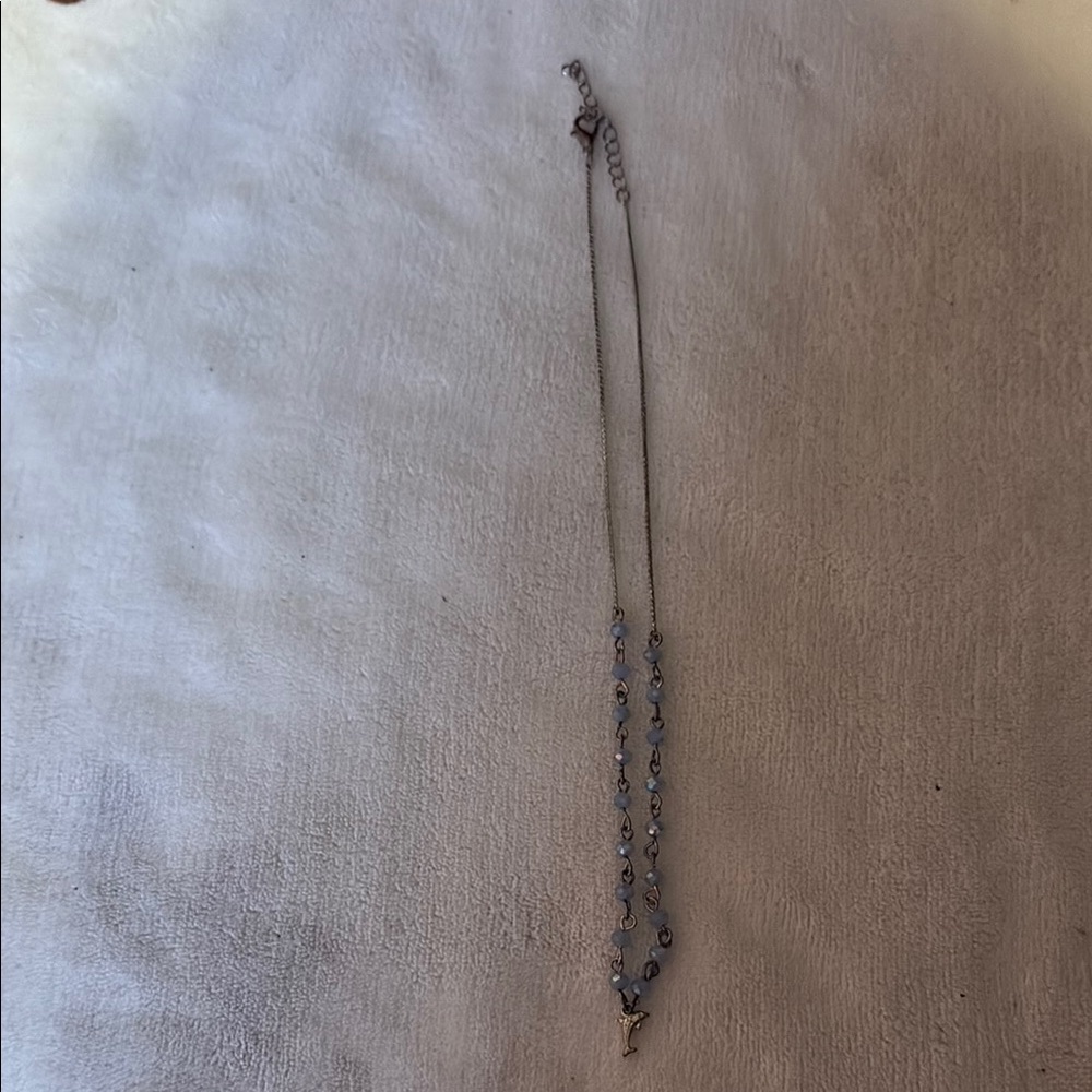Elegant Silver Dolphin Necklace with Blue Accents